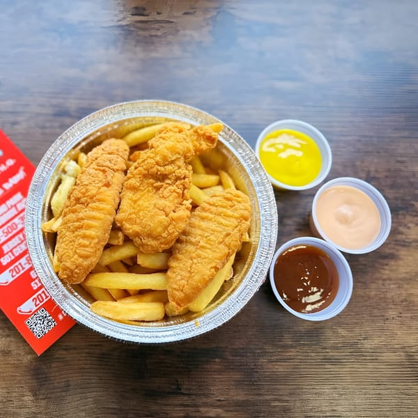 Lomo Truck's crispy chicken tenders and golden fries in a foil container with three dipping sauces.